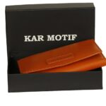 PASSPORT HOLDER ; PASSPORT BAG ;PASSPORT POUCH; TRAVEL POUCH; TRAVEL ORGANIZER; BRAND KAR MOTIF ; ARTICLE NUMBER -  KM 002, COLOUR - ORANGE