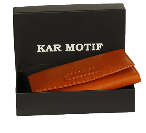 PASSPORT HOLDER ; PASSPORT BAG ;PASSPORT POUCH; TRAVEL POUCH; TRAVEL ORGANIZER; BRAND KAR MOTIF ; ARTICLE NUMBER - KM 002, COLOUR - ORANGE